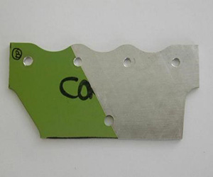 Ein Beispiel für Laserarbeit mit einem Metallelement